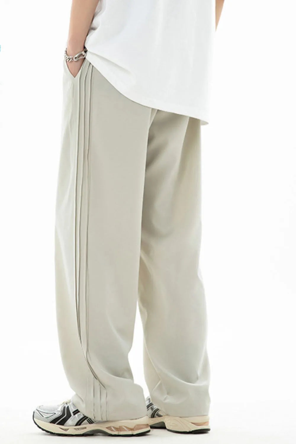 Men's plus size drawstring loose fit pants in light fabric.
