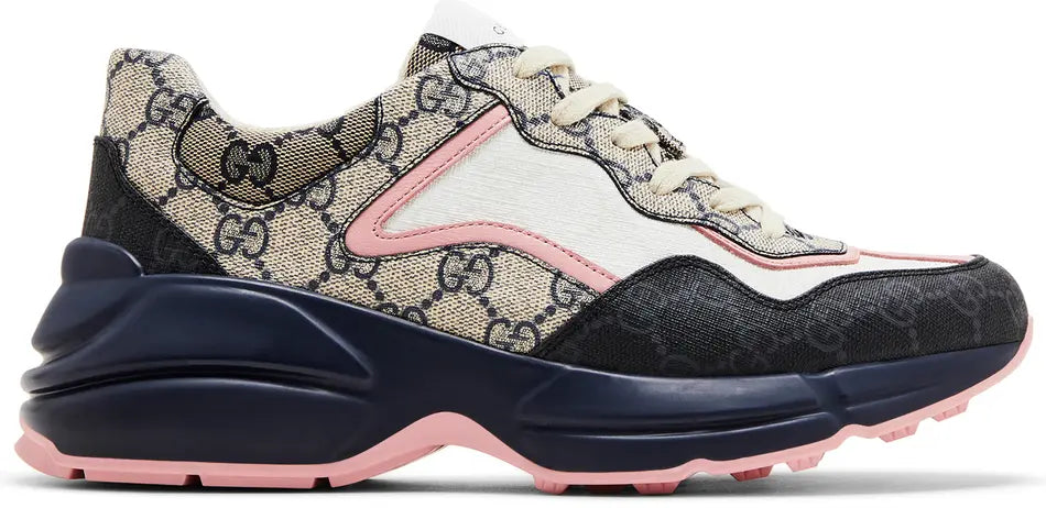 Gucci Rhyton Sneaker in beige and blue monogram design with chunky sole for women.