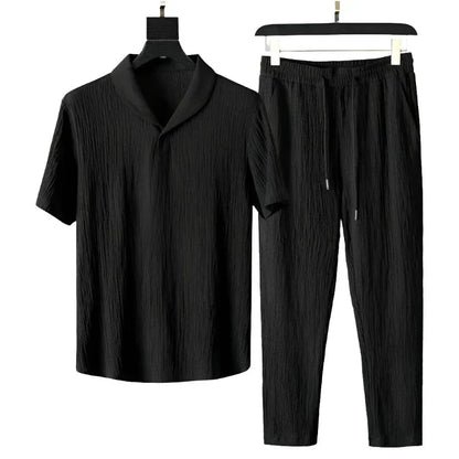 Summer Men Vacation set with short sleeves, v-neck, and drawstring closure in solid black.
