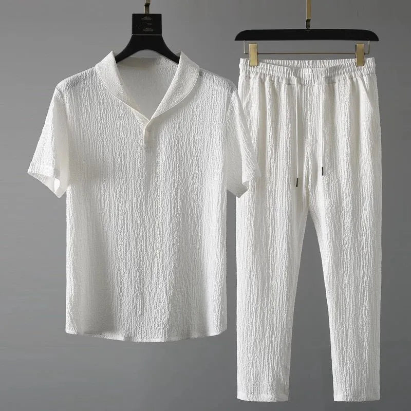 Summer Men Vacation set in white with v-neck, short sleeves, and drawstring pants.