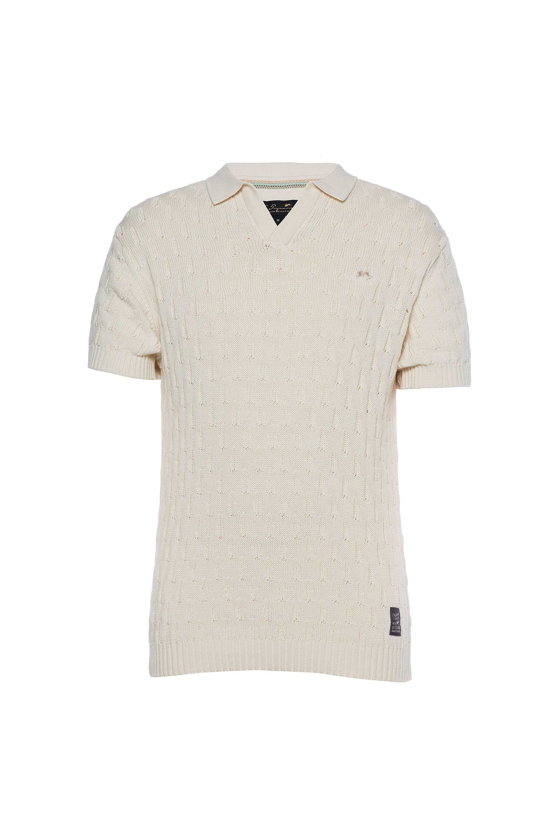 Jacquard knit polo with short sleeves, ribbed collar, and signature rabbit embroidery.