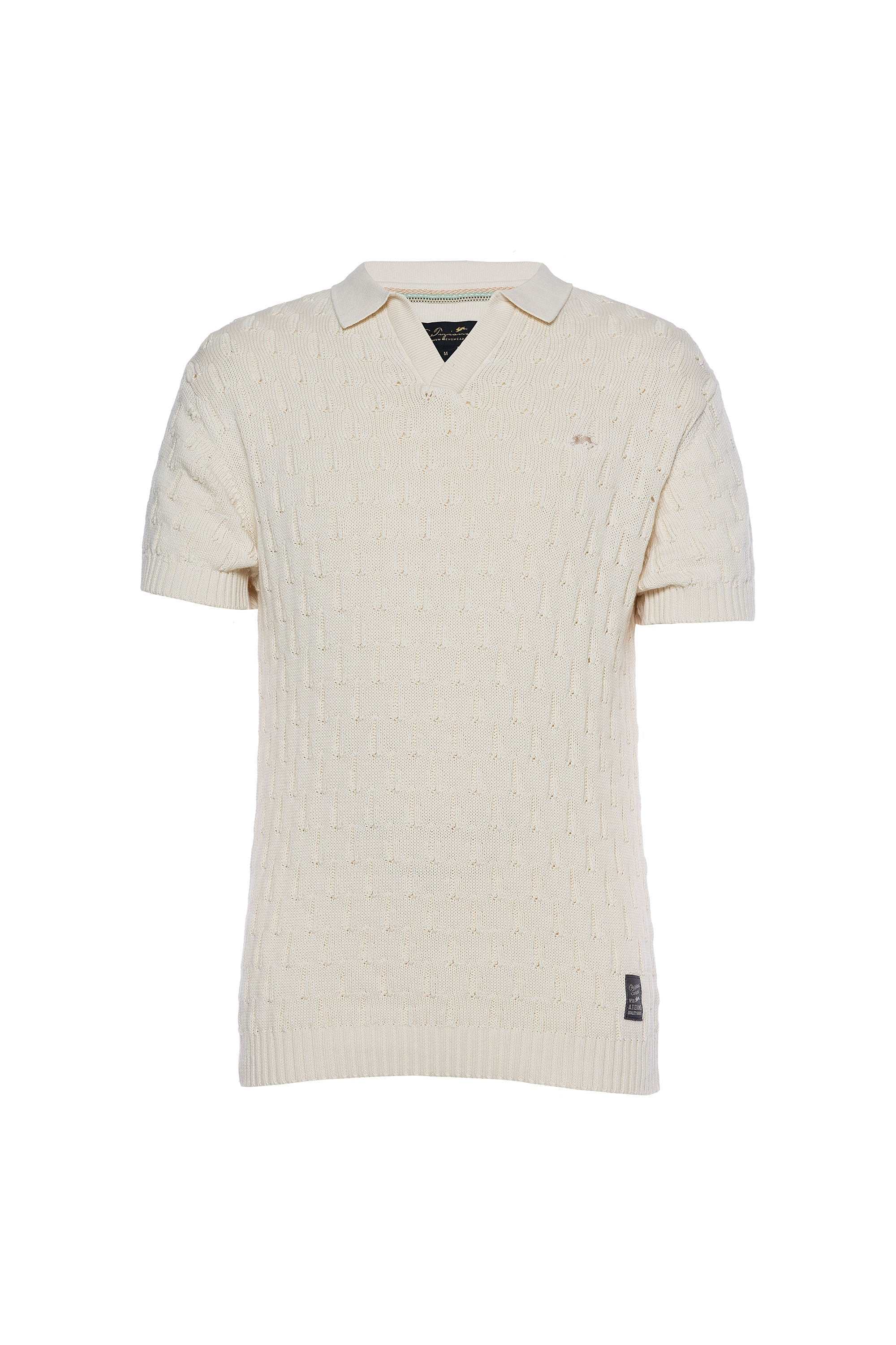 Jacquard knit polo with short sleeves, ribbed collar, and signature rabbit embroidery.