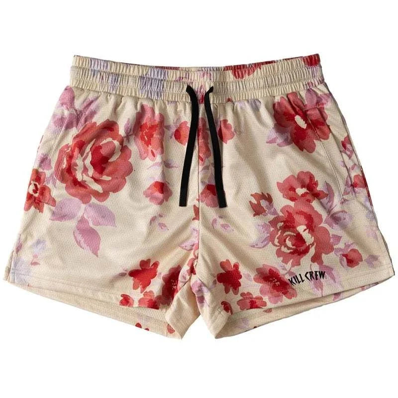 Floral patterned New Drip Sports men's beach shorts with drawstring closure.
