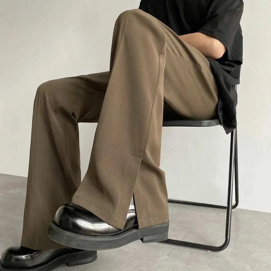 Men's brown black suit pants, loose flared style, casual formal wear.