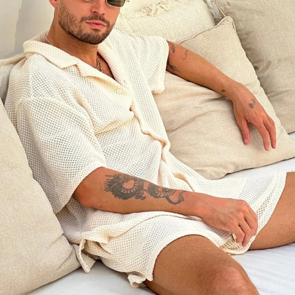 Luxury men beach wear set with short sleeves, solid pattern, and comfortable fit.