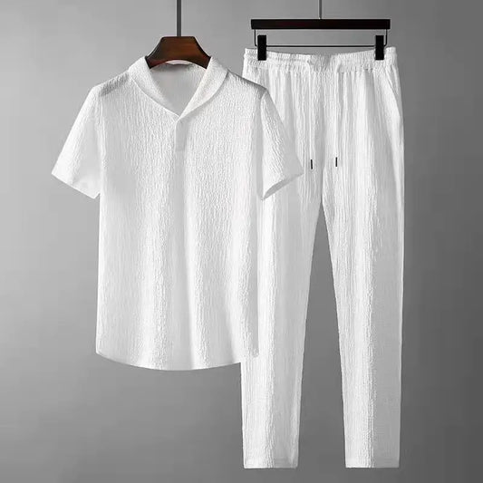 Summer Men Vacation set with short-sleeve v-neck shirt and drawstring pants in solid white.