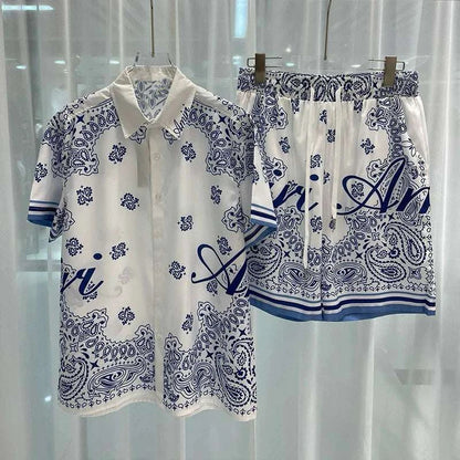 Men's vacation casual beach shorts set with paisley print, featuring a collared shirt and drawstring shorts, ideal for spring and summer outings.