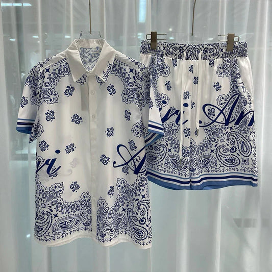 Men's vacation casual beach shorts set with paisley print, featuring a collared shirt and drawstring shorts, ideal for spring and summer outings.