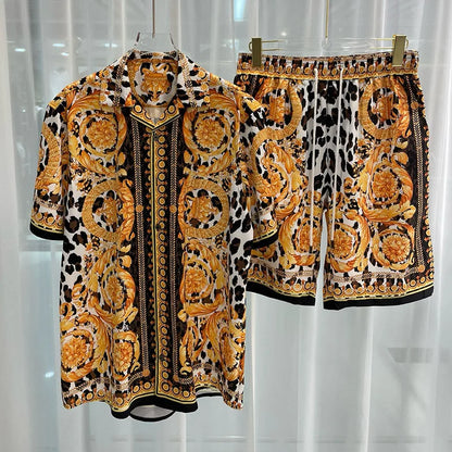 Vintage luxury two-piece beach shorts set with intricate patterns and short sleeves.