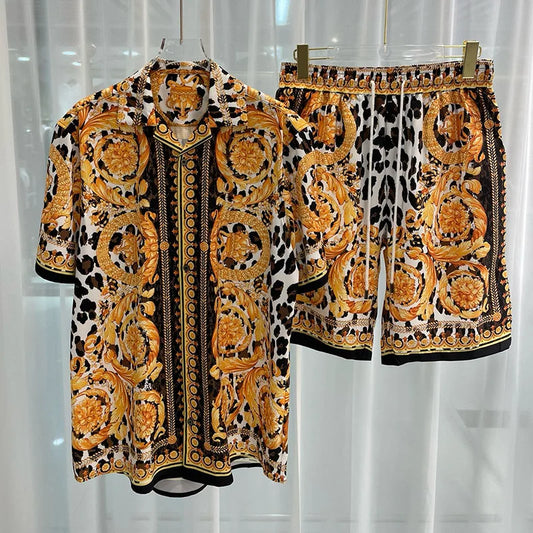 Vintage luxury two-piece beach shorts set with intricate patterns and short sleeves.