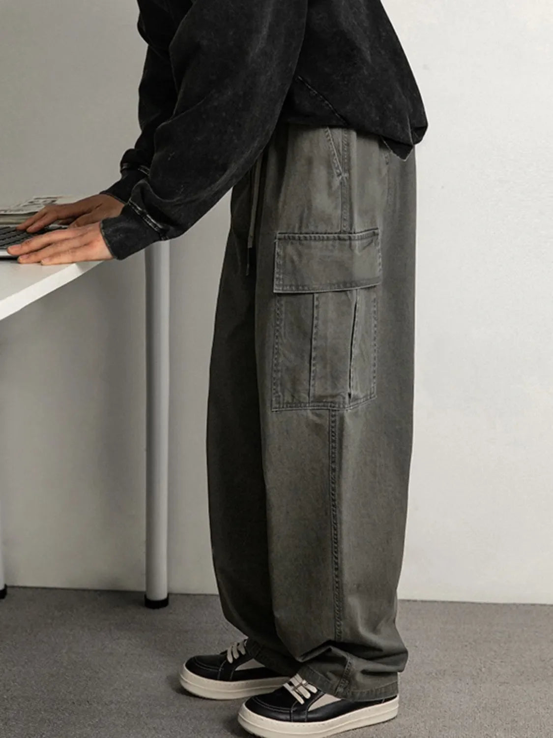 Men's plus size drawstring pants with cargo pockets in gray, polyester material.