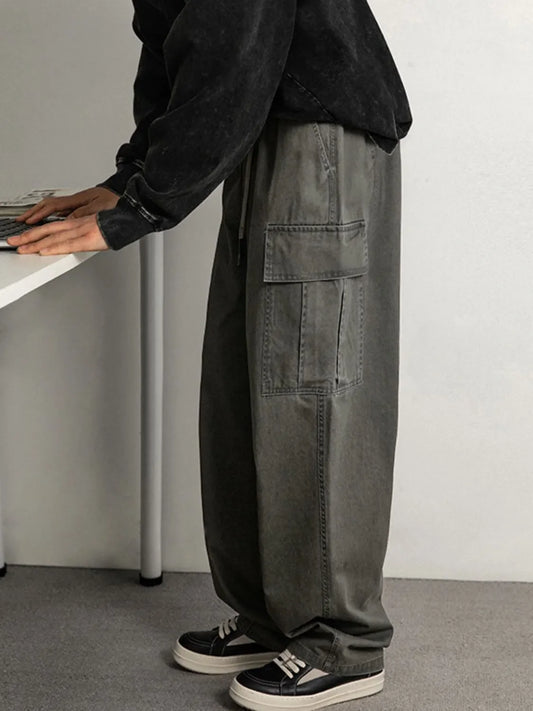 Men's plus size drawstring pants with cargo pockets in gray, polyester material.