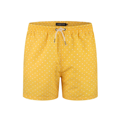 Yellow polka dot St Lucia swim shorts with elastic waistband and drawstring.