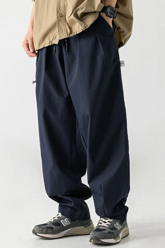 Men's plus size drawstring pants with pockets, 100% polyester.
