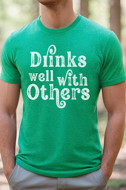 St Patrick's Day Drinks Well With Others green tee featuring a durable screen-printed design.
