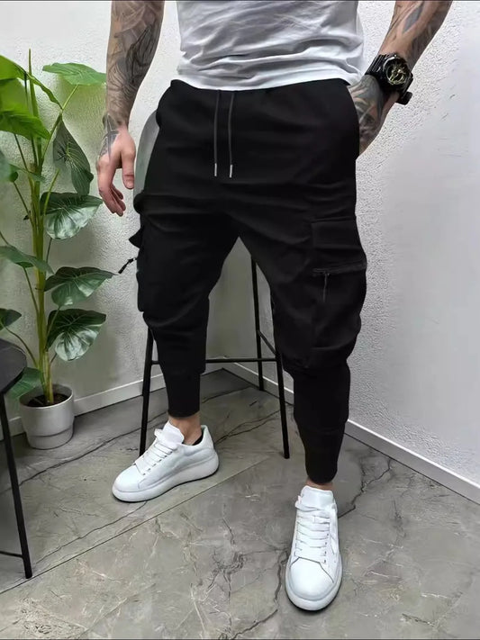 Men's full size black drawstring pants with pockets, basic style, cotton and spandex blend.