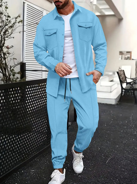Men's full size button up long sleeve top and pants set in blue, showcasing a classic design ideal for loungewear.