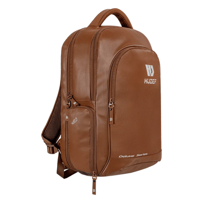 Deluxe Series Pickleball Backpack in brown leather with multiple compartments and padded straps for comfort.