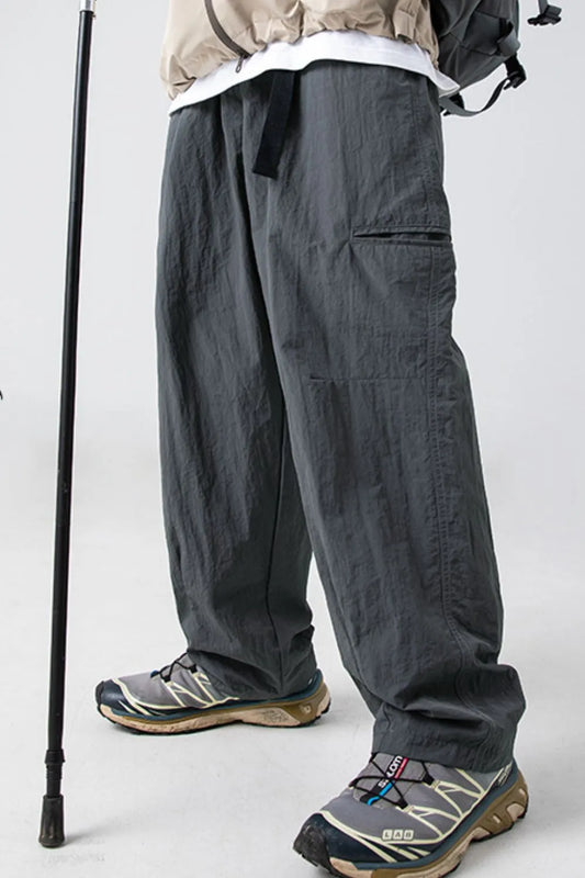 Men's plus size elastic waist pants, nylon material, basic style.