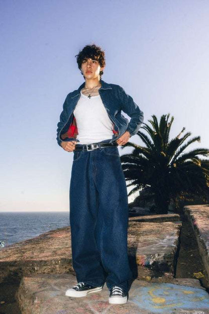 Men's denim baggy fit jeans styled for a relaxed, casual look with a wide leg opening and classic design.
