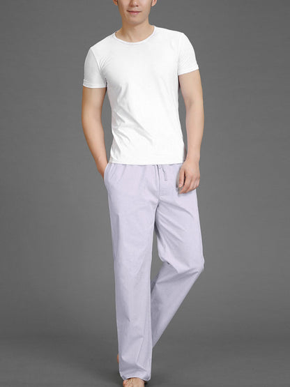 Men's spring summer thin cotton casual pants with a lattice pattern, shown on a model in a white t-shirt.