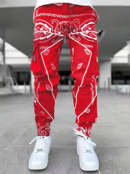 printed cashew flower harem pants men in vibrant red with multi-pocket design