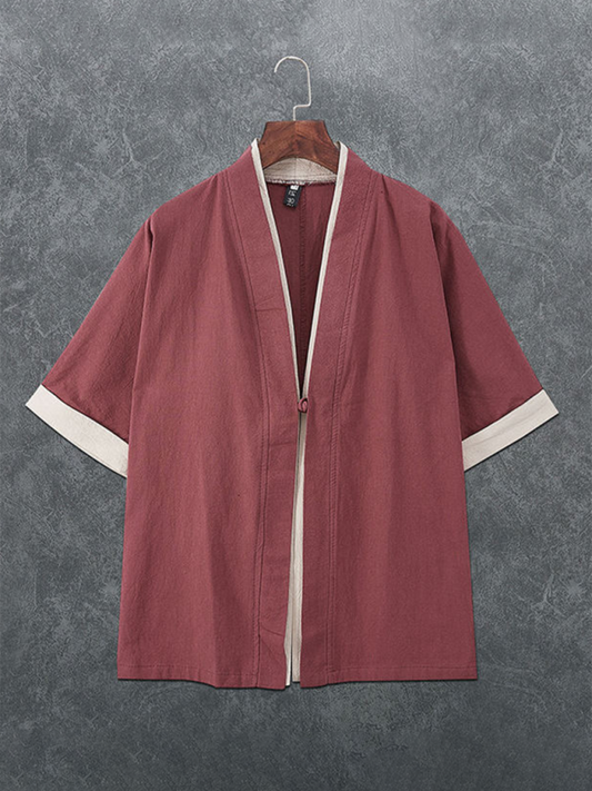 Men's casual solid color button-up linen t-shirt with disc button detailing for spring-summer style.