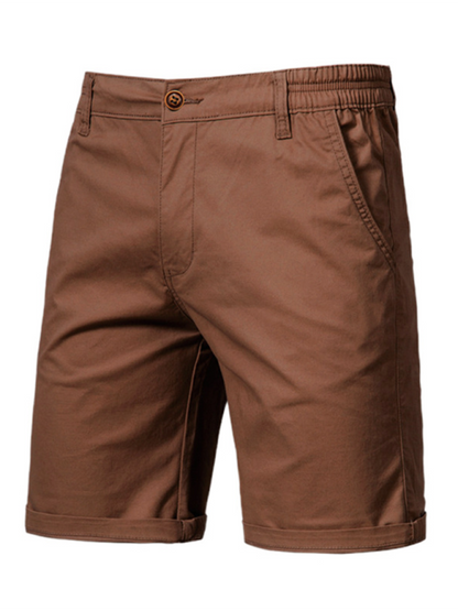 Men's stylish cotton slim fit casual shorts in solid color with practical pockets, ideal for spring-summer.