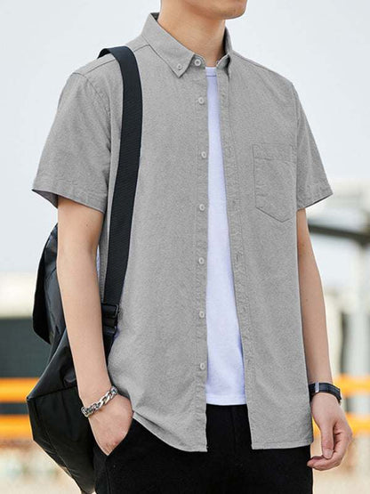 Youthful casual Oxford short-sleeved shirt with stylish double pockets, perfect for effortless outings.