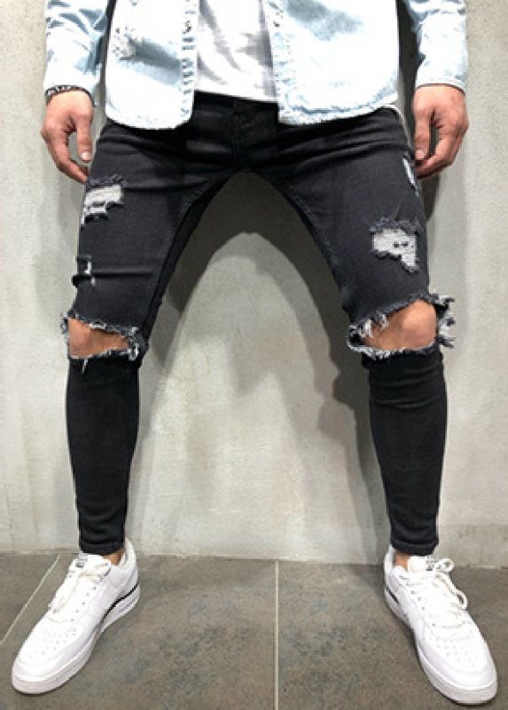 Men's all-season slim-fit elastic denim jeans with distressed finish.