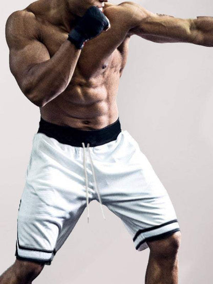 Men's outdoor fitness shorts, white with black trim, perfect for basketball and leisure activities, featuring an adjustable drawstring waist.