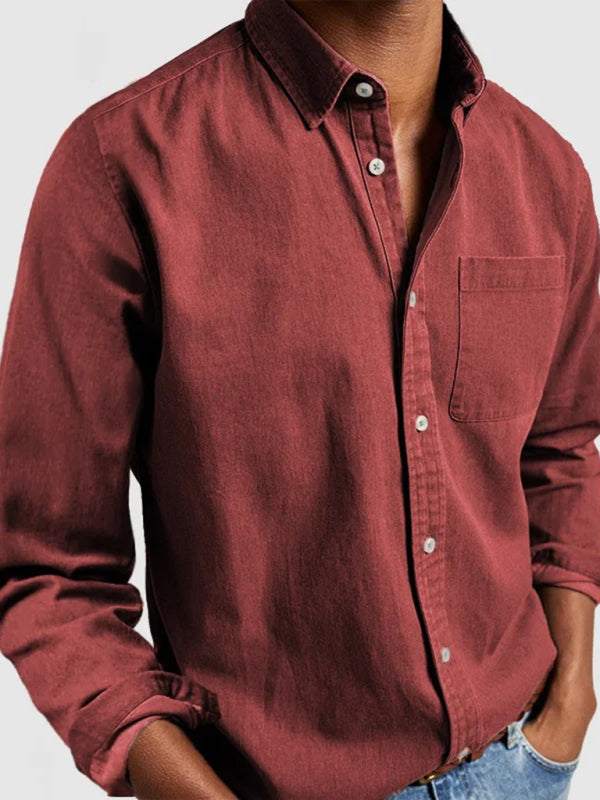 Sophisticated autumn-winter men's shirt with lapel collar and welt pocket in burgundy.