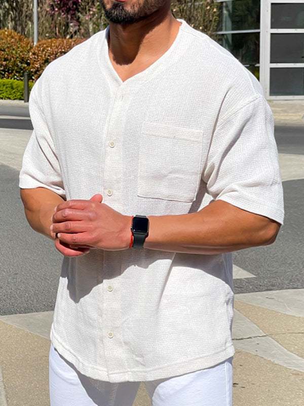 Men's casual woven drop shoulder shirt in solid color, featuring short sleeves and a comfortable cotton blend material, ideal for spring-summer styling.