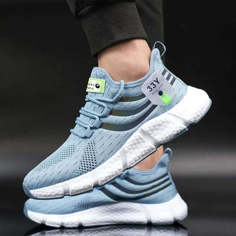 Men's breathable lightweight sport shoes in light blue, featuring a mesh upper and lace-up closure for outdoor running and walking.