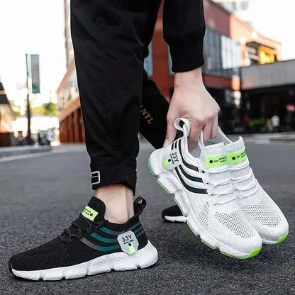 Men's casual sport shoes in black and white, breathable mesh design, lightweight sneakers for outdoor running and jogging.
