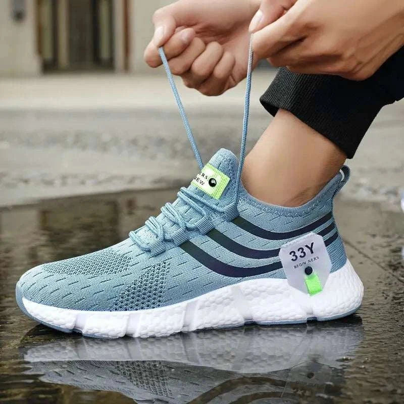 Men's casual sport shoes, breathable mesh, lightweight, black outdoor running sneakers.
