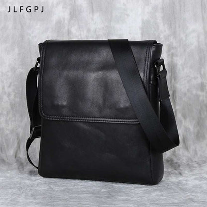 Men's genuine leather crossbody bag in black with adjustable shoulder strap, perfect for everyday essentials.