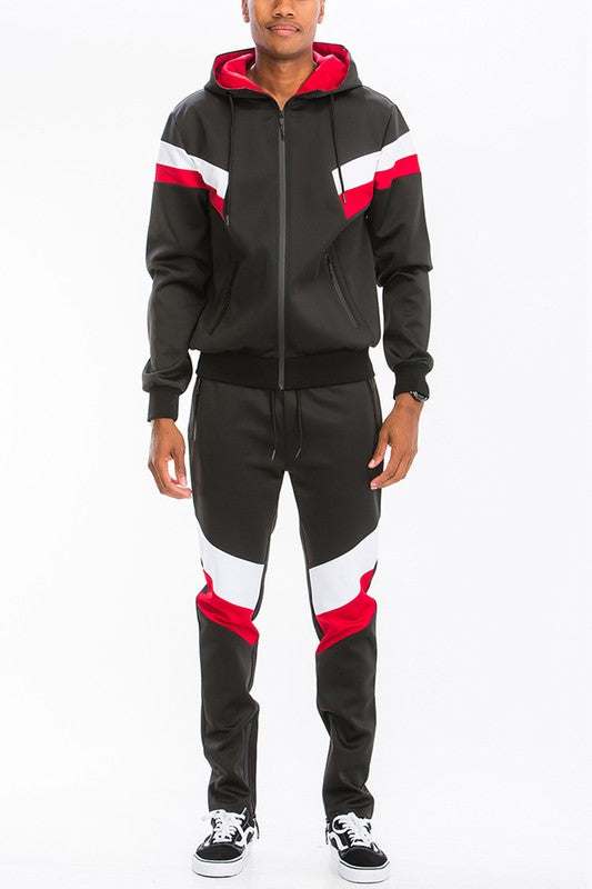 Chevron Stripe Full Zip Track Suit with hoodie and elastic waist, ideal for workouts and casual wear.