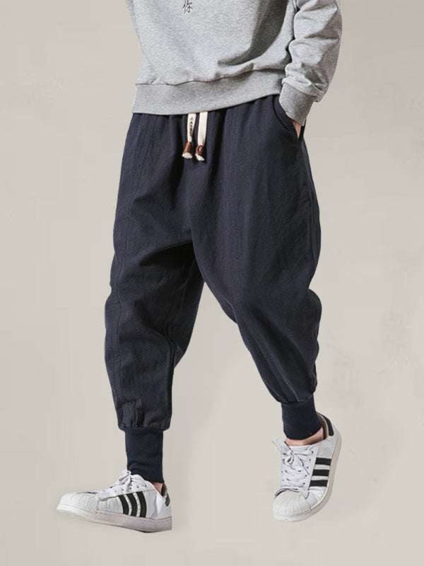 Chic linen hip hop breathable cotton trousers in solid color for men.