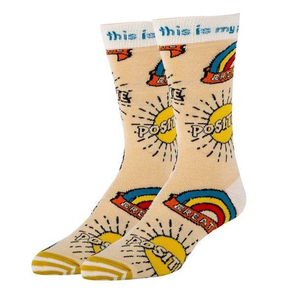 Men's cotton crew funny socks with positive slogan and colorful design.