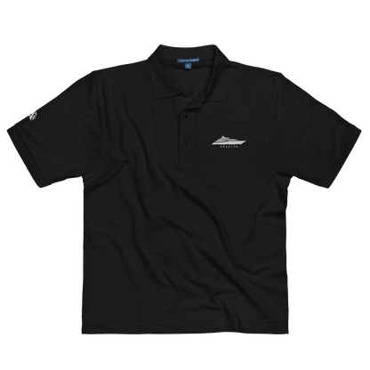 Men's black premium polo with embroidered logo, featuring relaxed fit and flat knit collar.