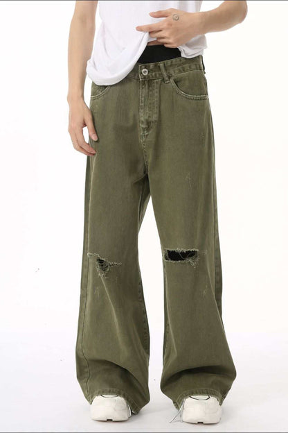 Distressed wide leg jeans with pockets in olive green.