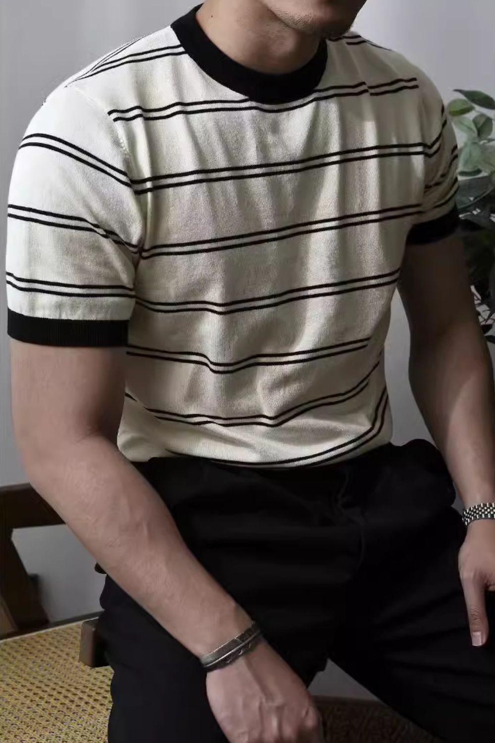 Men's plus size round neck striped t-shirt with moderate stretch, worn by model.