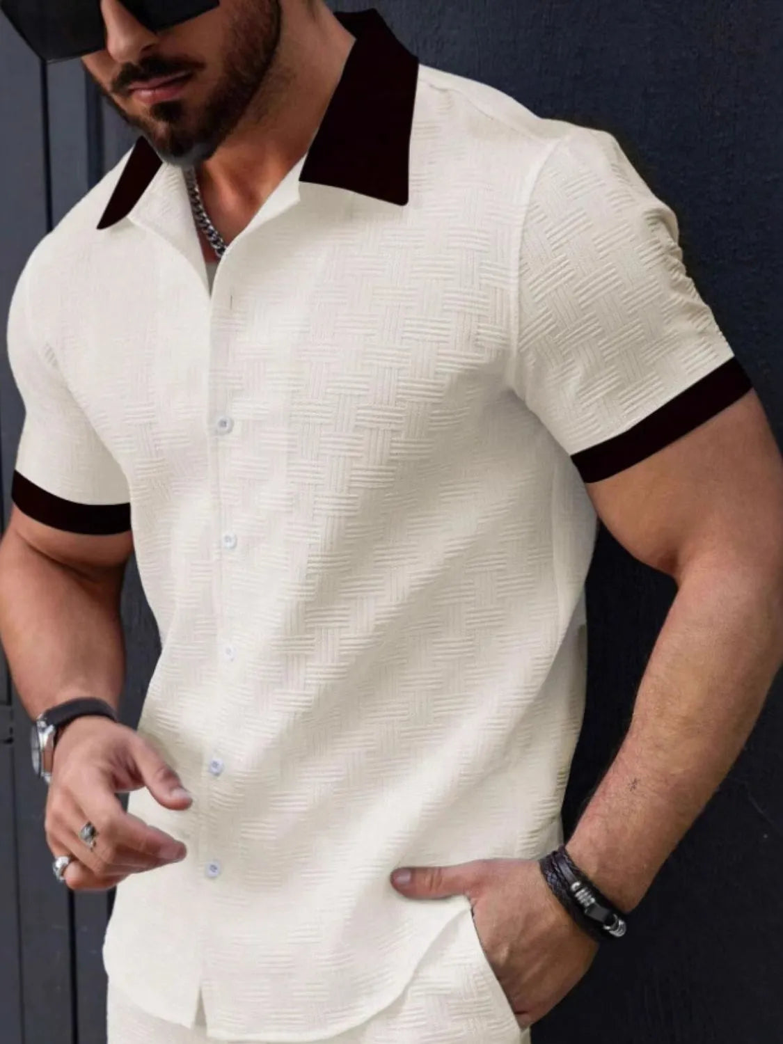 Men's button up short sleeve shirt, polyester, basic style, slightly stretchy, model wearing white.