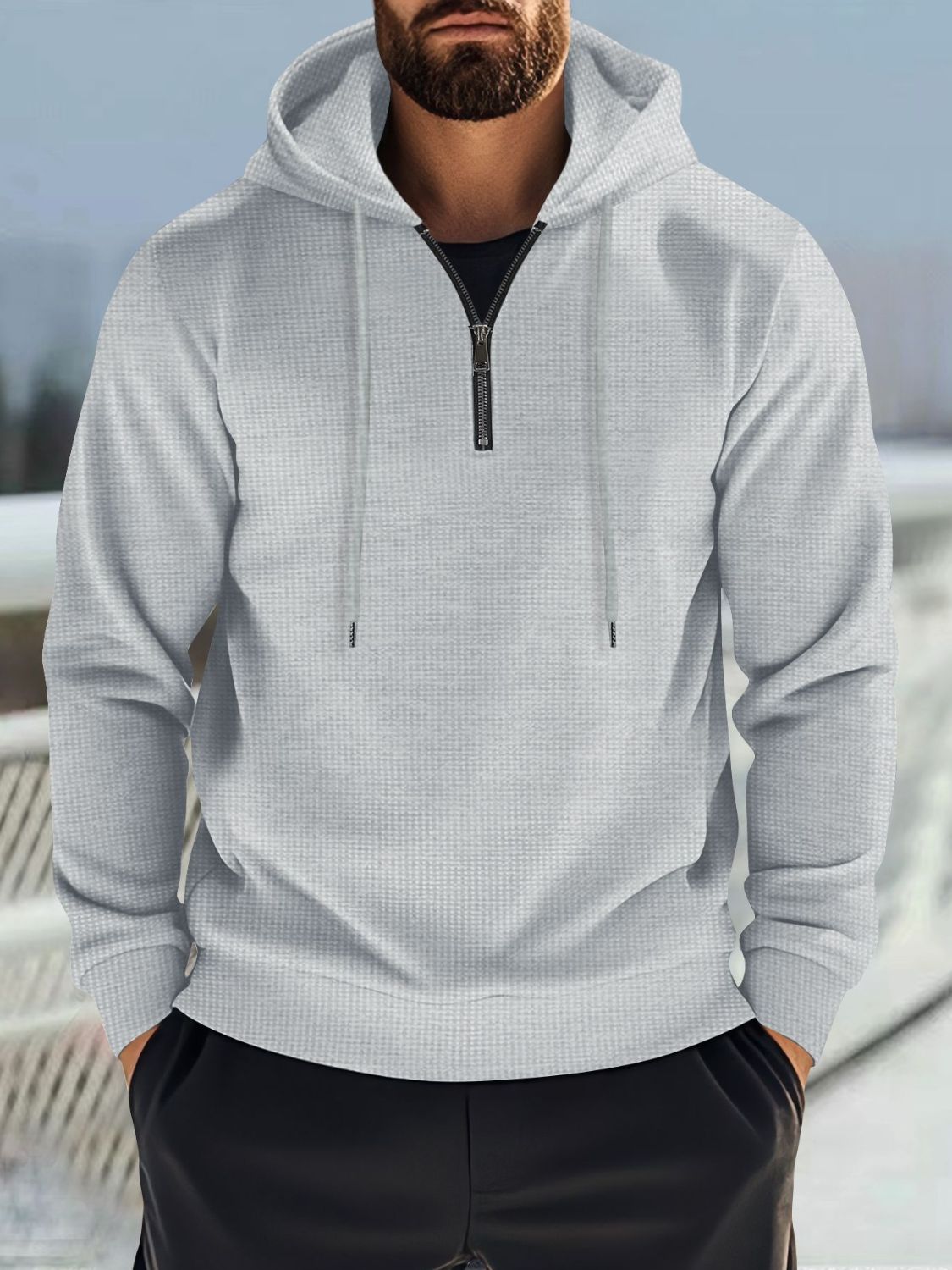 Men's full size quarter zip long sleeve hoodie with drawstring.