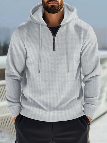 Men's full size quarter zip long sleeve hoodie with drawstring.