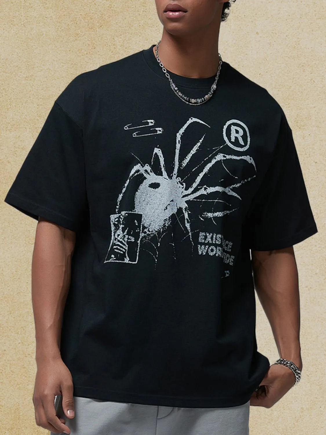 Men's graphic round neck black t-shirt with spider design, half sleeves, 100% cotton.