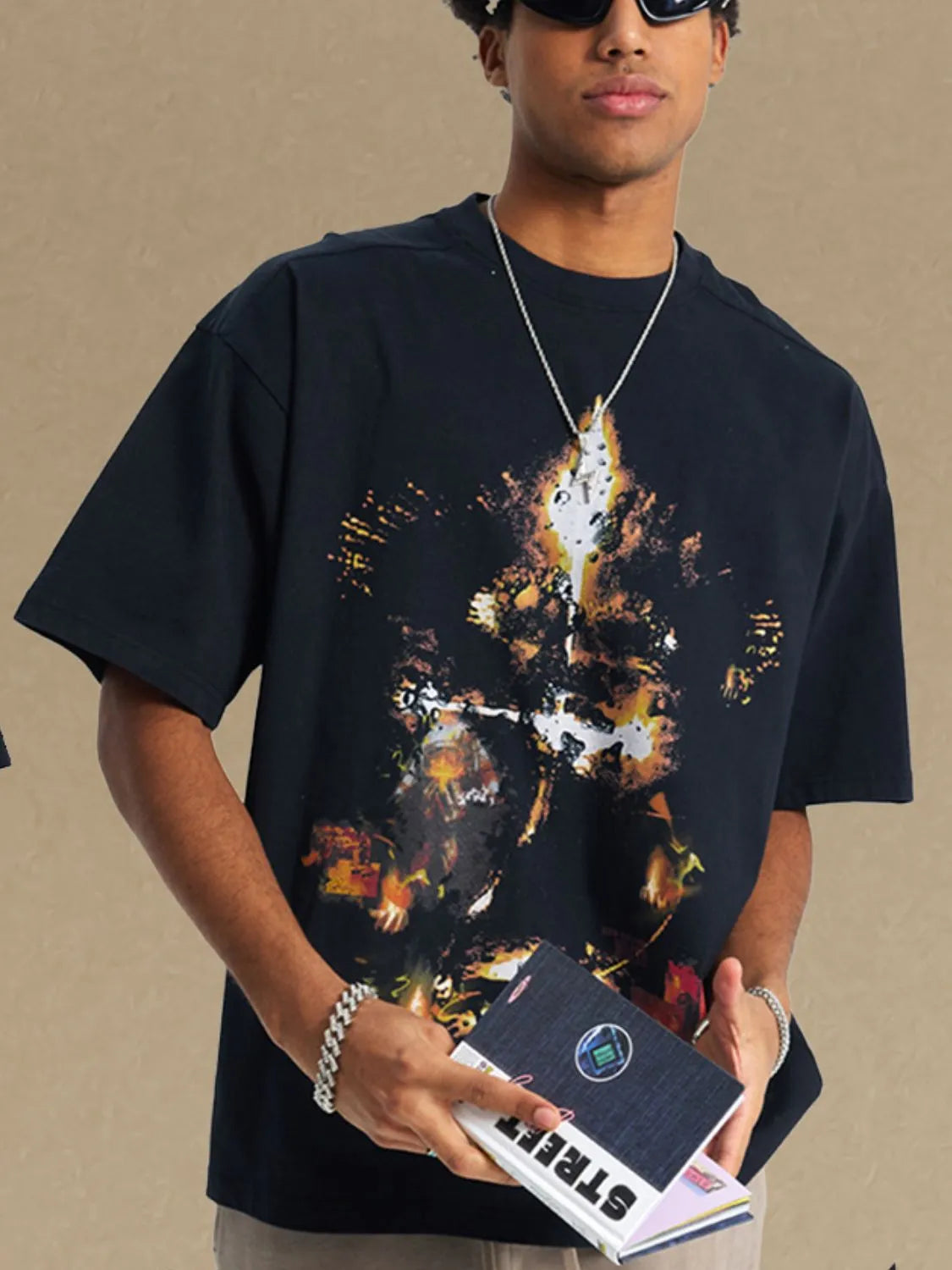 Men's graphic round neck half sleeve t-shirt in black with abstract design, 100% cotton.