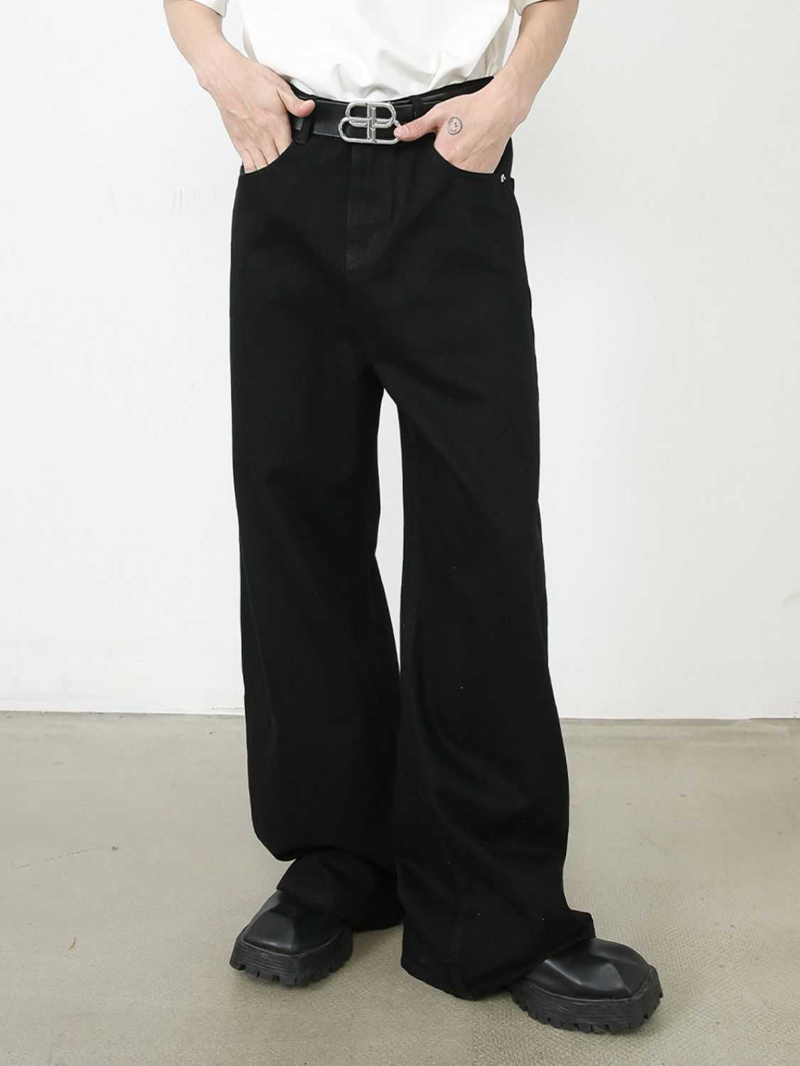 Men's mid rise wide leg jeans, black, pocketed, buttoned, no stretch, casual style.