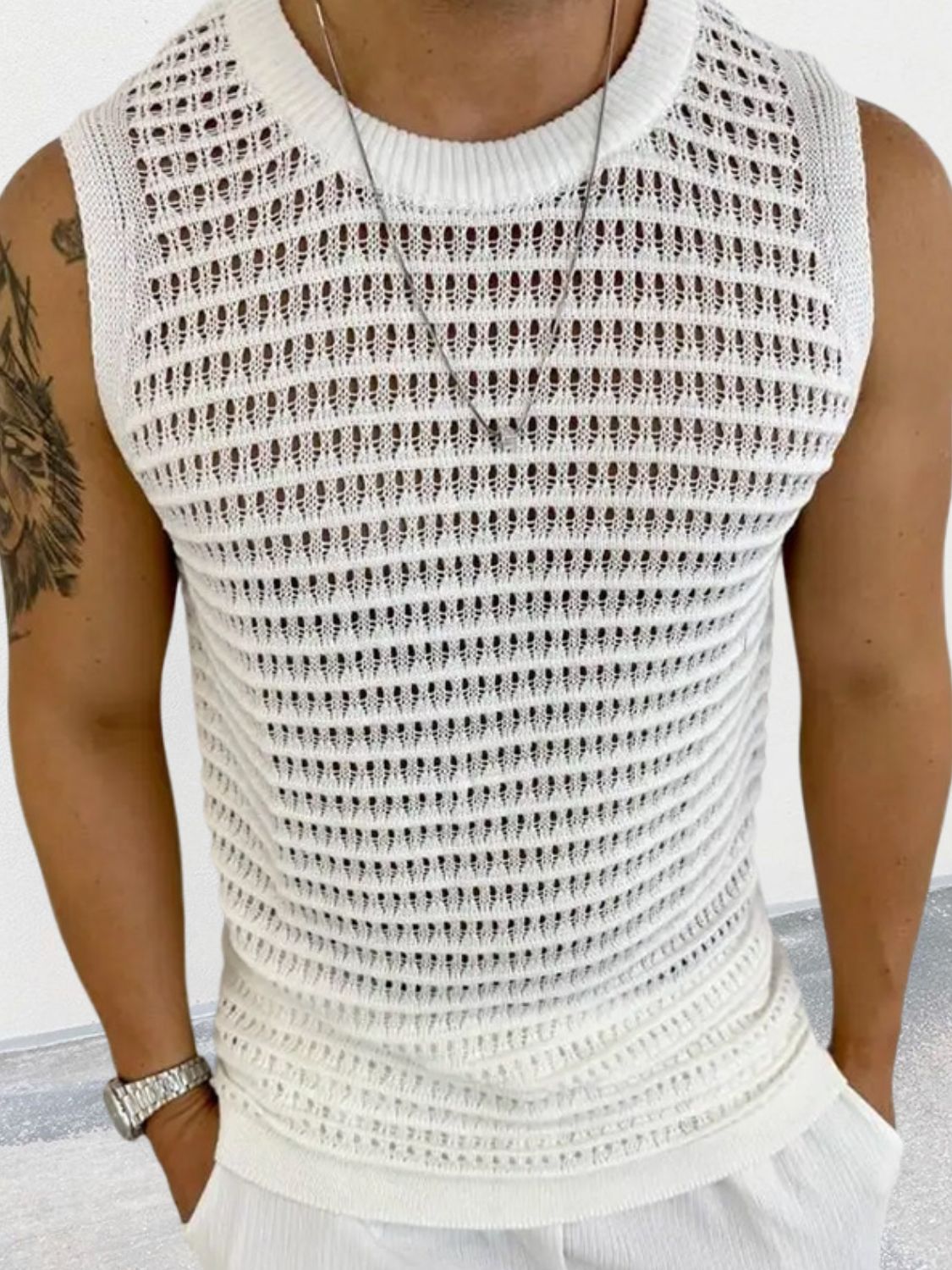 Men's round neck hollow out sleeveless knit top in white.